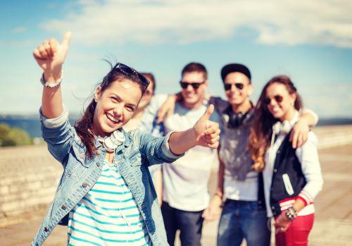 An image showing a group of people smiling after getting cosmetic dentistry in Wahroonga, NWS