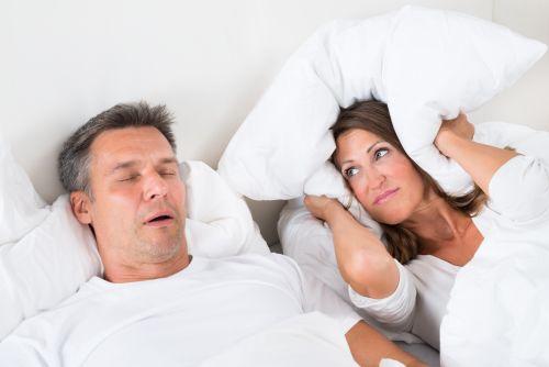 An Image showing a woman in distress from the snoring of her partner in Wahroonga, NWS