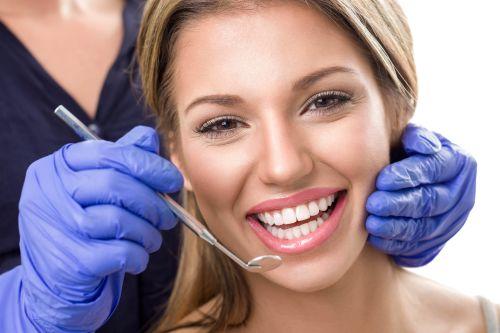 An image of a woman smiling after getting a cosmetic dental treatment in Wahroonga, NWS