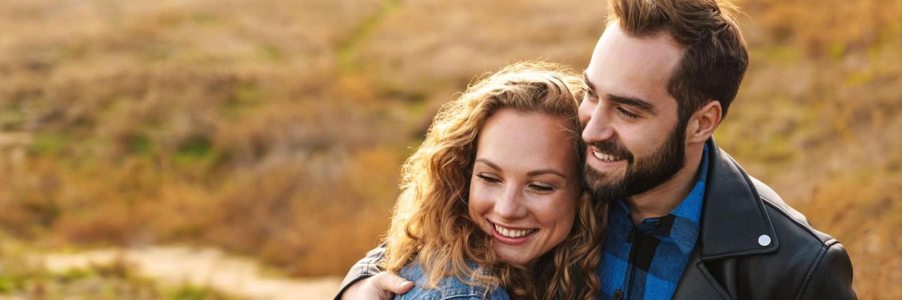 A couple smiling after a getting a cosmetic dentistry service in Wahroonga